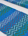 Alpaka-Jacquardschal ZigZag in Türkis von Manuela Bedford.