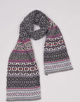 Alpaka-Jacquard-Schal in Grau-Pink von Manuela Bedford – locker gelegt auf hellem Hintergrund.